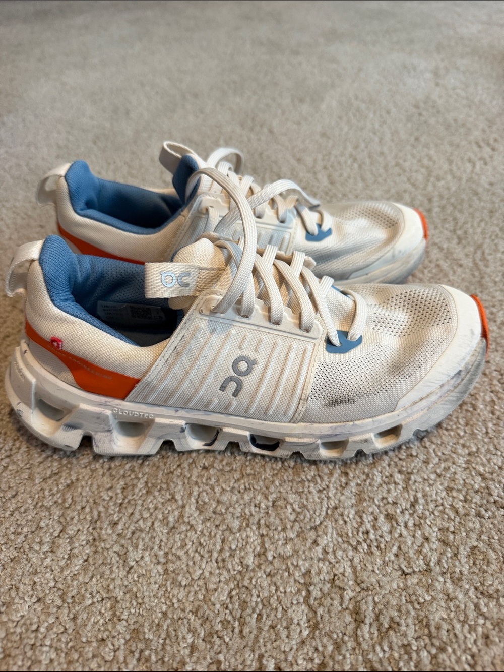 On Running Kids White Sneakers with Orange & Blue Accents